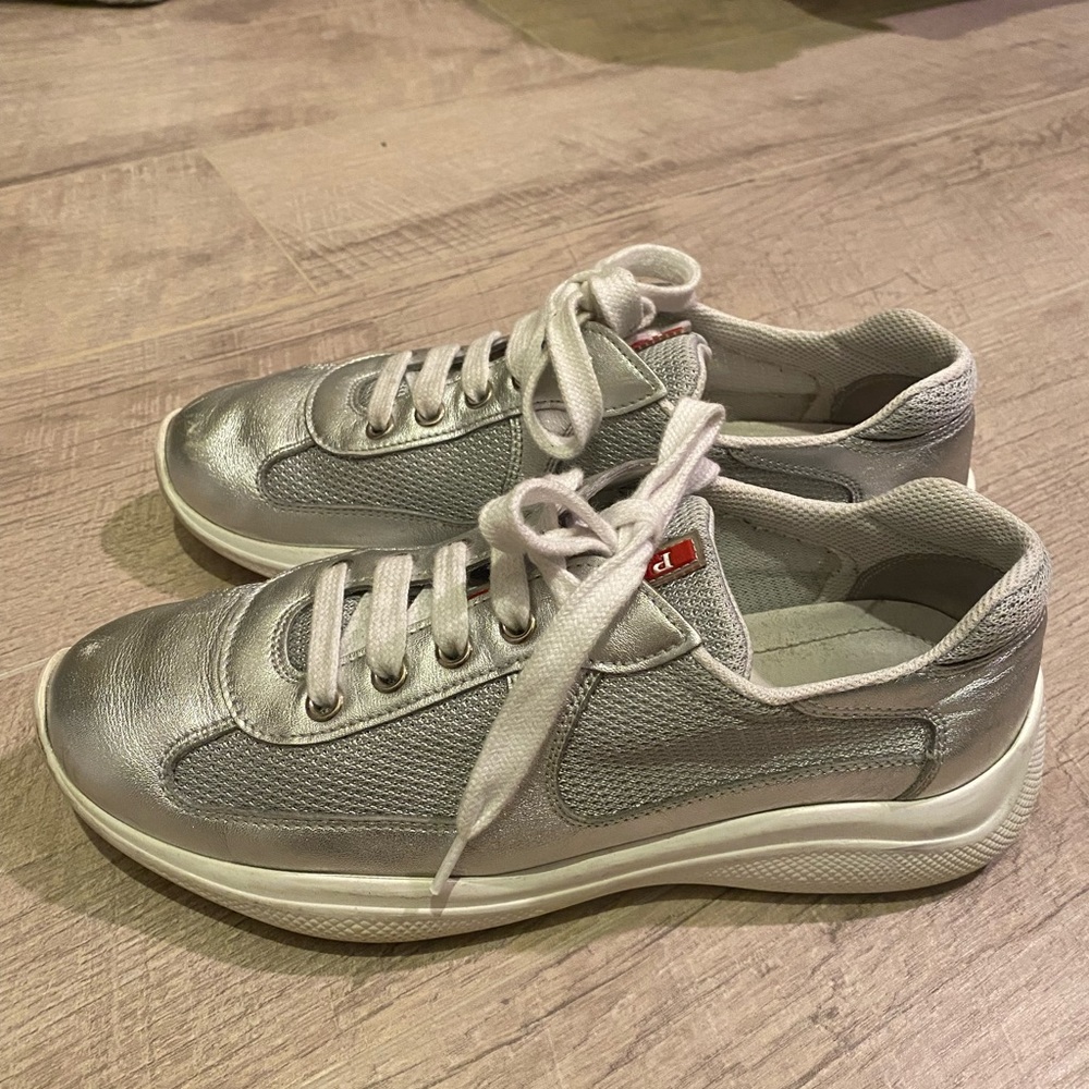Prada “New American” sneaker in metallic silver